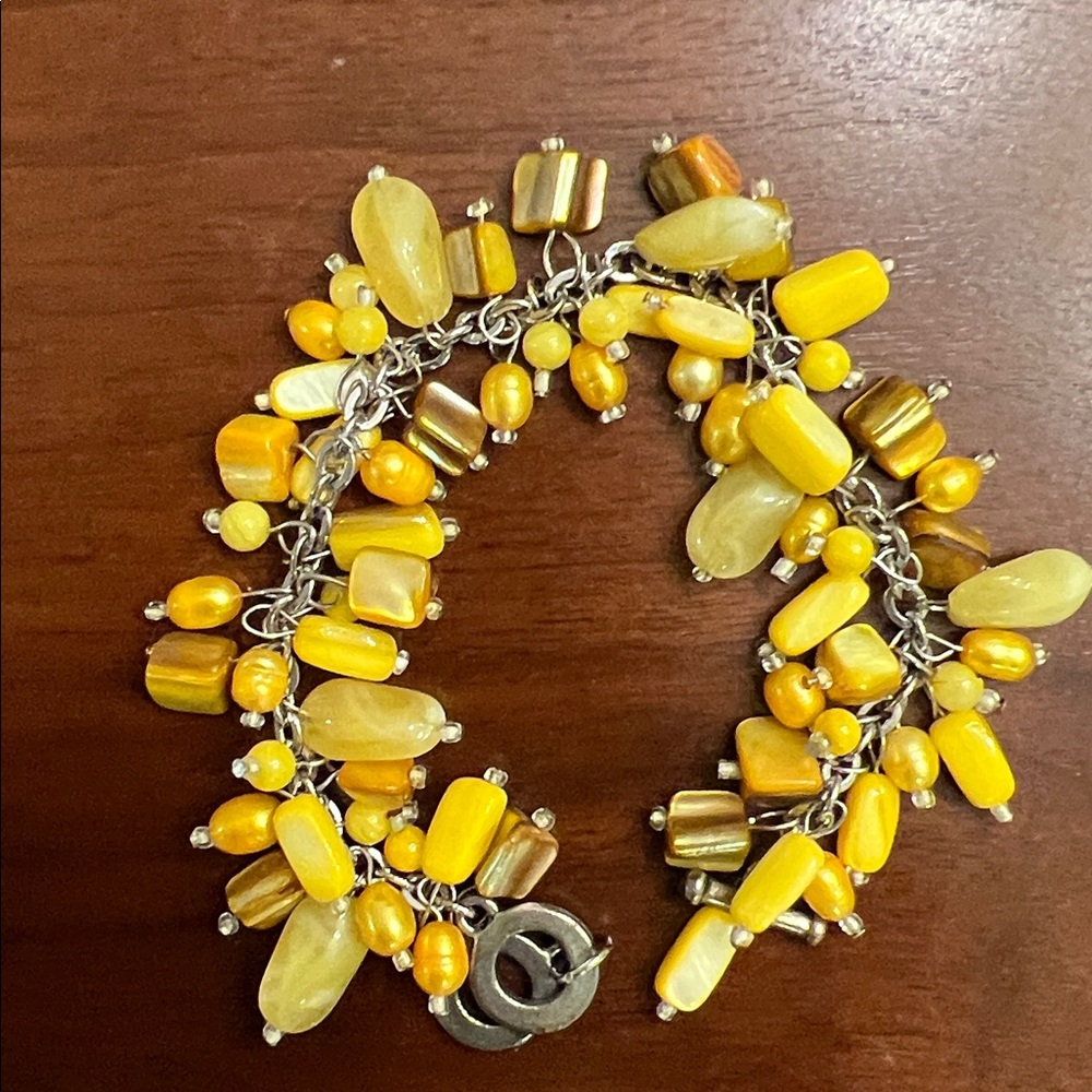 Beautiful beaded bracelet with warm yellow and bronze coloured beads